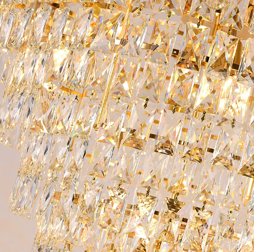 Cascade of Brilliance: Gold-Trimmed Crystal Chandelier